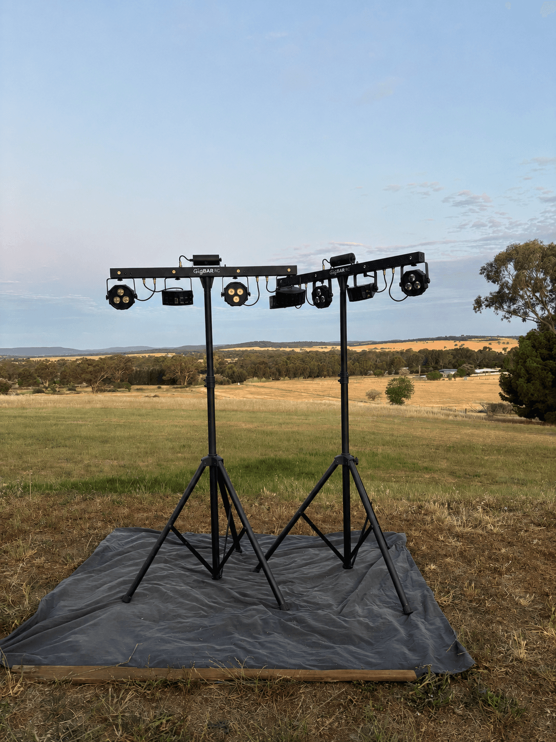 Two Chauvet GigBAR all-in-one lighting units on stands